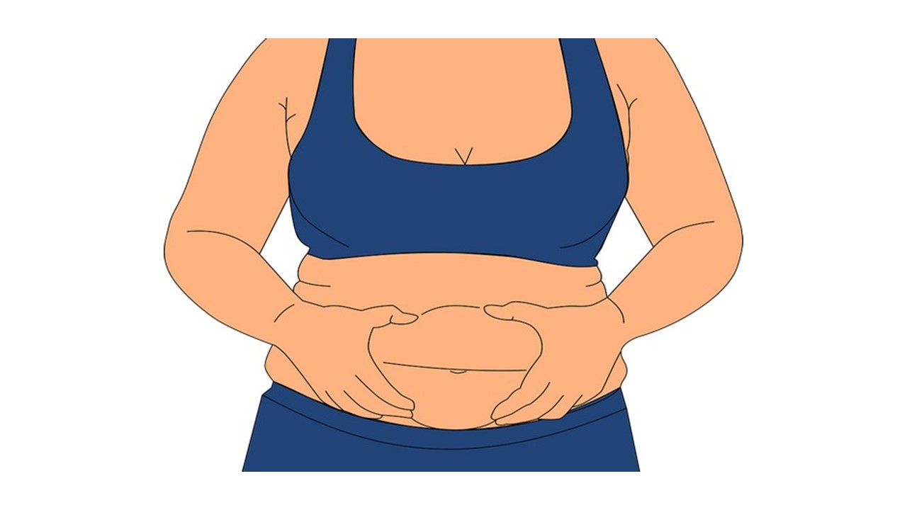 Woman squishing her fat belly